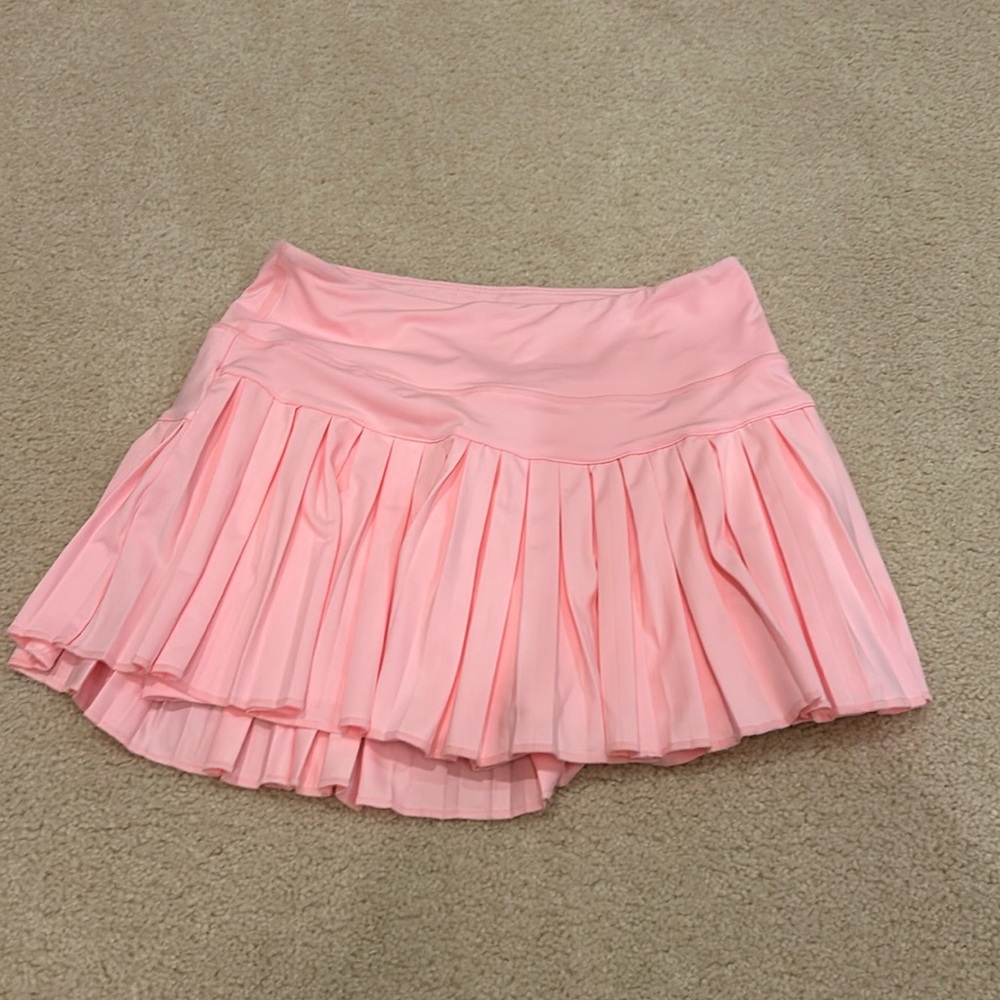 Gold hinge pink tennis skirt
